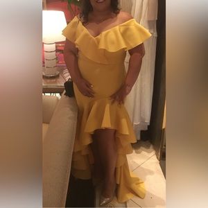 The perfect yellow frilly party dress that will make a statement.